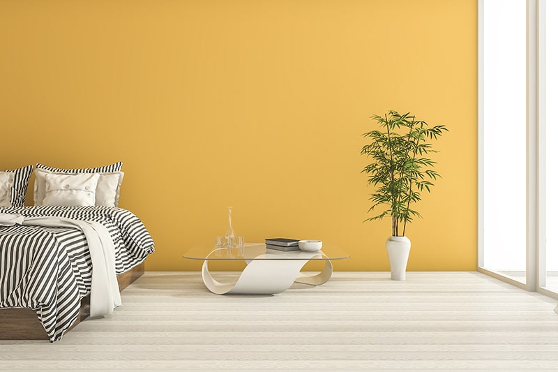 Best bedroom paint colors for wall is yellow, which looks cheerful and sunny