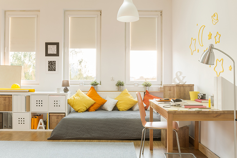 Bedroom decoration with a mini-bed seat beside the window pane makes for the perfect reading spot