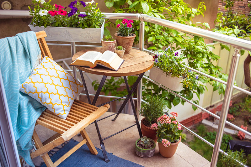 Front balcony design for small house a cafe table and chair is the bare minimum to have a home front balcony design simple