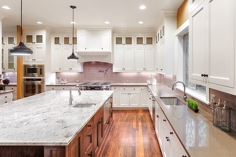 Kitchen island cupboards gives extra space to make a suitable kitchen cupboard design model