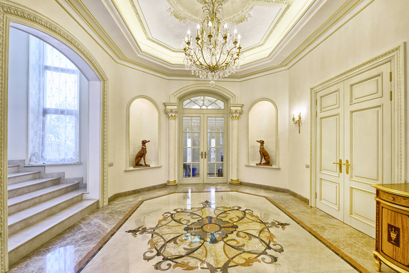 Marble floor design which is outstanding with the colours of the furniture and marble design in hall