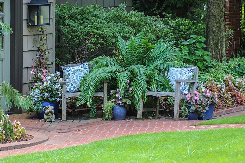 Outdoor garden design with a profusion of flowers and greenery