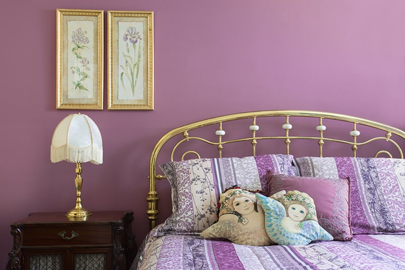 Paint colour combination for bedroom with purple to do the right balance, with splashes of red, turquoise