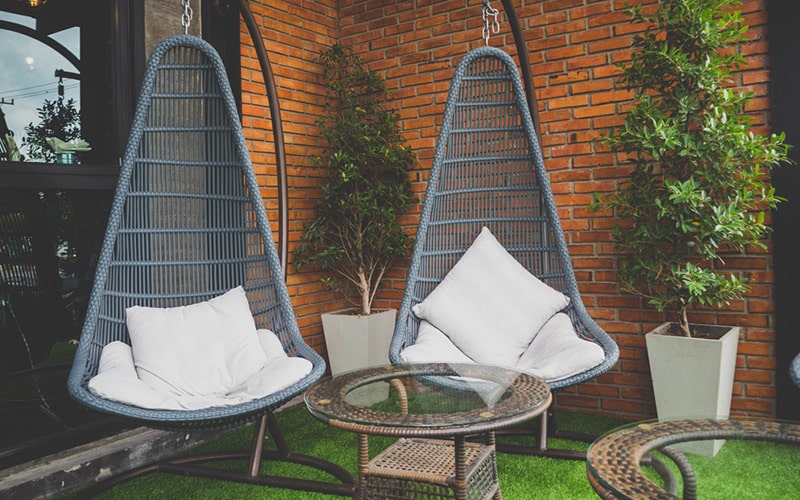 Swings and hammocks are popular for elegant outdoor balcony furniture