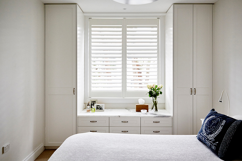 modern bedroom cupboard design for a narrow cupboard by the window