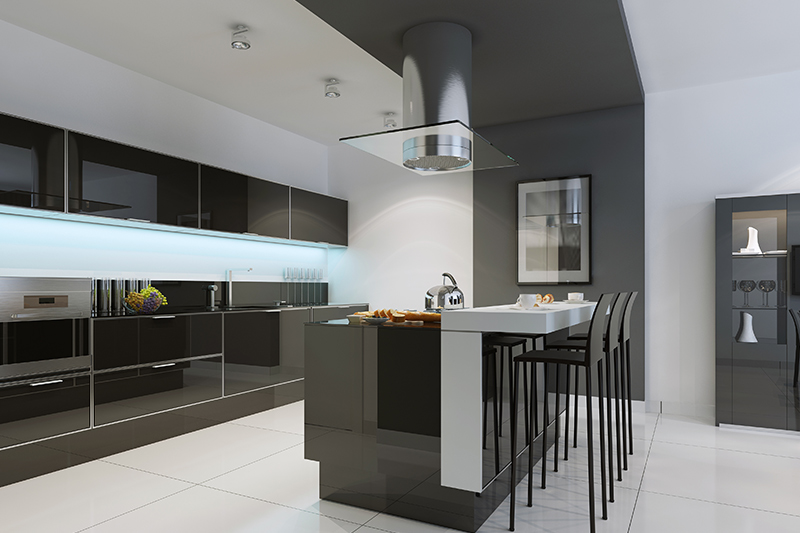 Go beautiful, island black kitchen cabinets with white countertops.