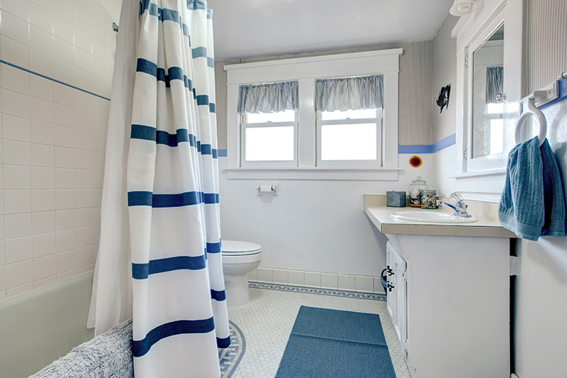 Blue and white bathroom curtains  which compliment each other so well and the combination is perfect 