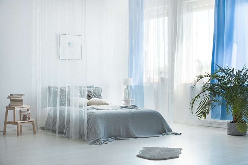 Blue bedroom curtains fit for minimalistic bedroom interiors and modern bedroom interiors