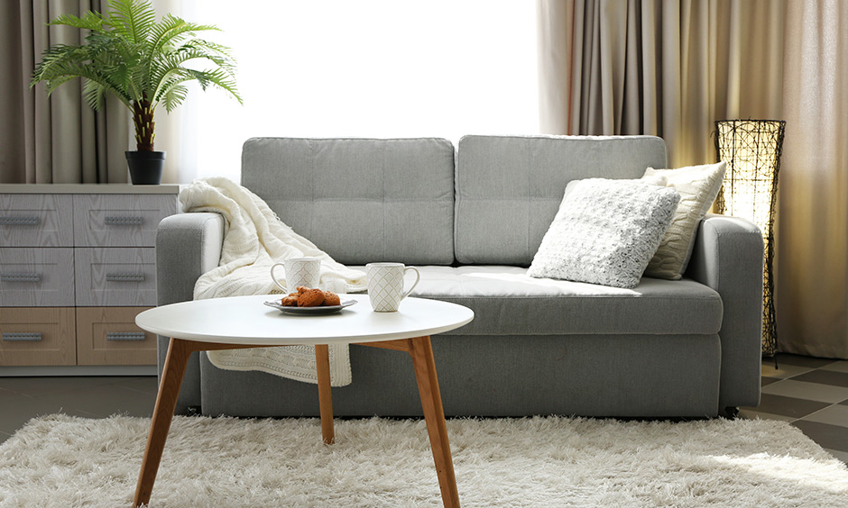 Home decorators coffee table with minimalistic dual-toned design.