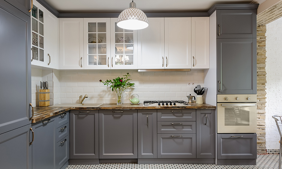 Grey and white kitchen cabinets will make your white kitchen look elegant, clean and contrast well. 