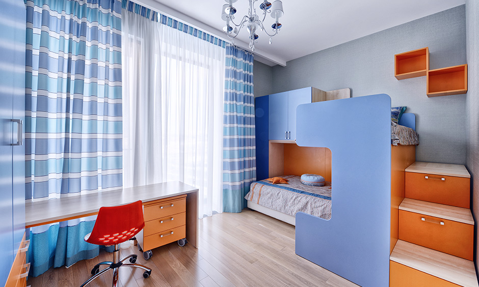 Kids bed designs with storage options in the form of side cabinets and stairs as drawers, and lift-up storage boxes