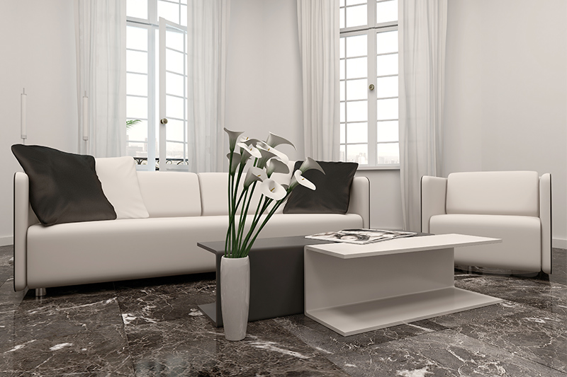 Straight lay marble tiles in a dark shade are a great option for your living room marble flooring design