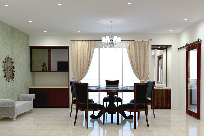 Modern dining room chandelier above a round dining table