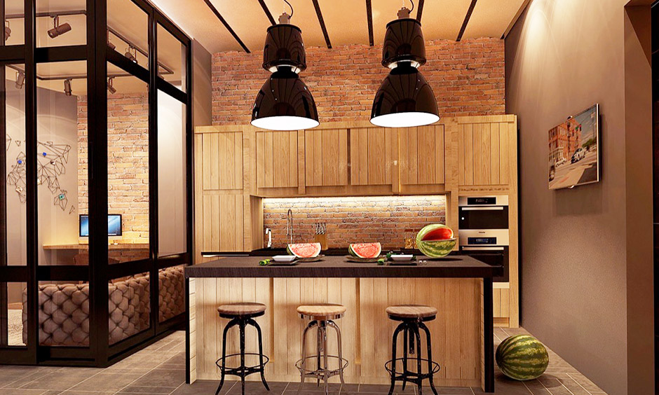 A rustic industrial-style kitchen comes with countertop and metal barstools