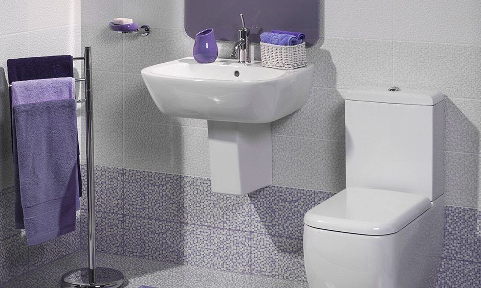 Bathroom sink design which is small and simple and perfectly fitted on a tiled wall