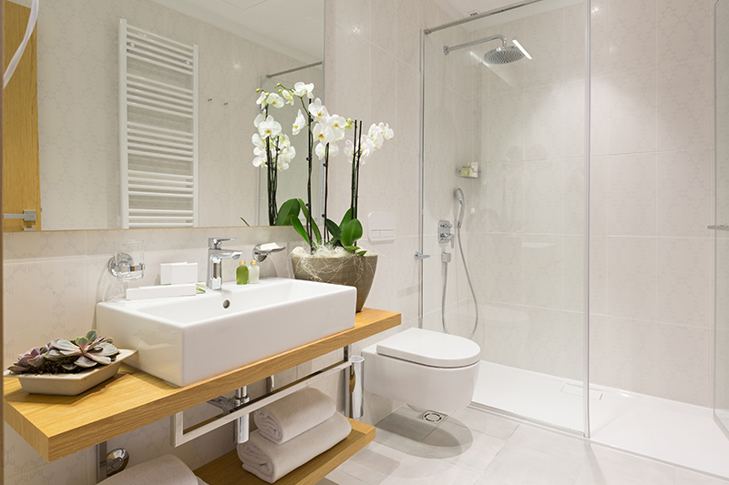 Replace curtain and add glass panel to small bathroom designs with shower to look clean. 