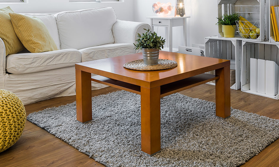 Coffee tables home with the square top design is an ideal way to add a traditional touch to your modern space.