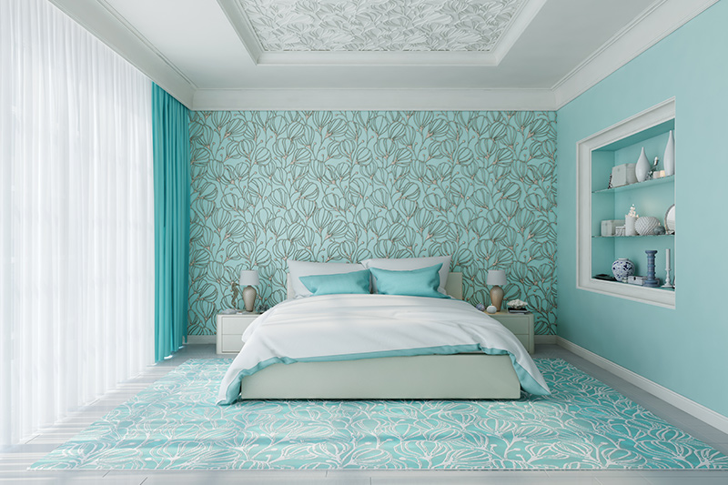 Sky blue bedroom walls with suitable wallpaper, pastel decor add up to make this type of bedroom more comforting.