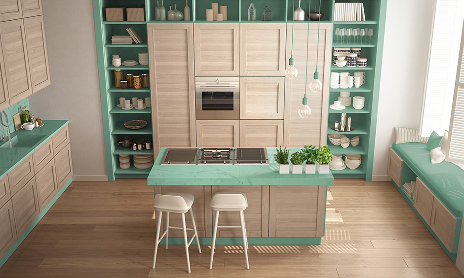 Aquamarine and beige themed green kitchen give a contemporary look.