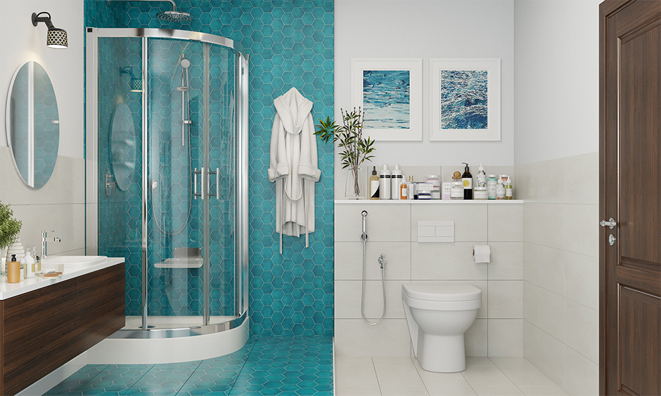 Aqua-themed bathroom floor wallpaper in geometric patterned stretches from the walls