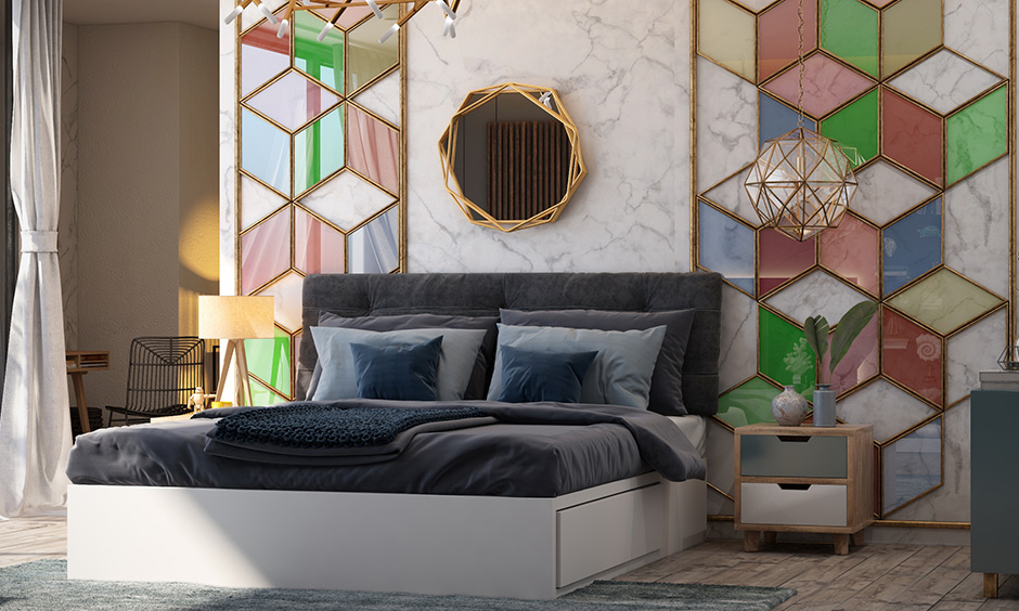 A bedroom accent wall with geometric patterns and comes with prismatic designs