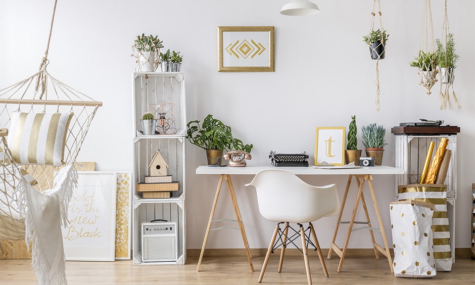 White themed bedroom decor with indoor hanging plants