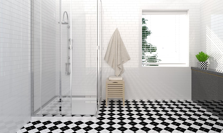 Black and white bathroom floor with a diamond pattern gives a beauty in your bathroom design