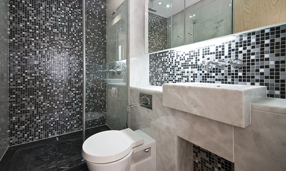 Mixing grey with black and white mosaic tile bathroom gives great look