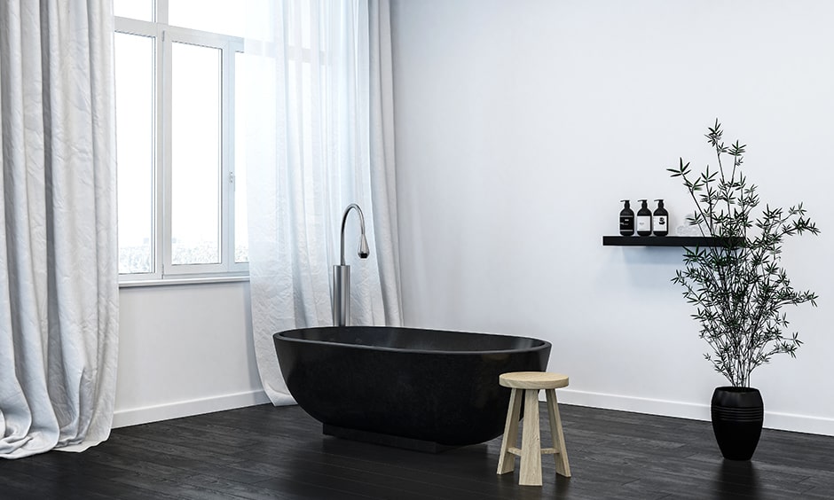 Modern black and white bathroom interior design with black vinyl flooring with white walls