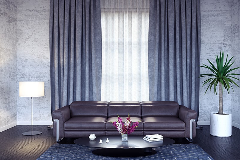 Blueish grey curtains bring in breezy cool vibes to window curtain design