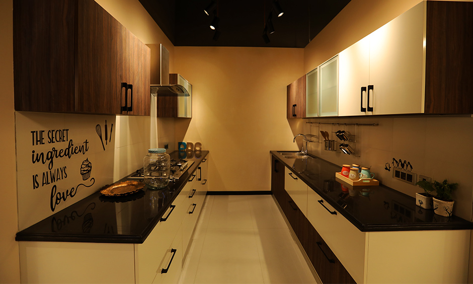 Modern classic kitchen design a counter made of black granite to give a clean seamless look.