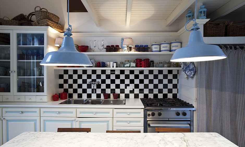 Country-style kitchen design by adding checkered black and white tiles