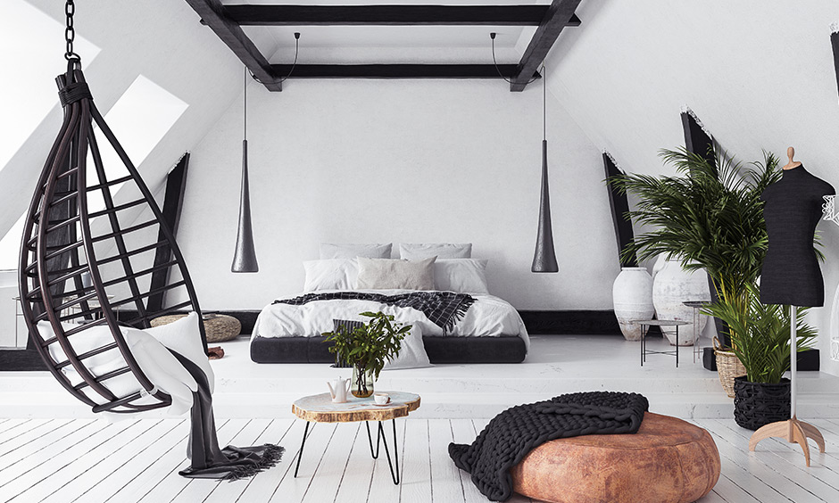 Wooden beams add immense warmth to spaces and a great decor element in the cozy bedroom.