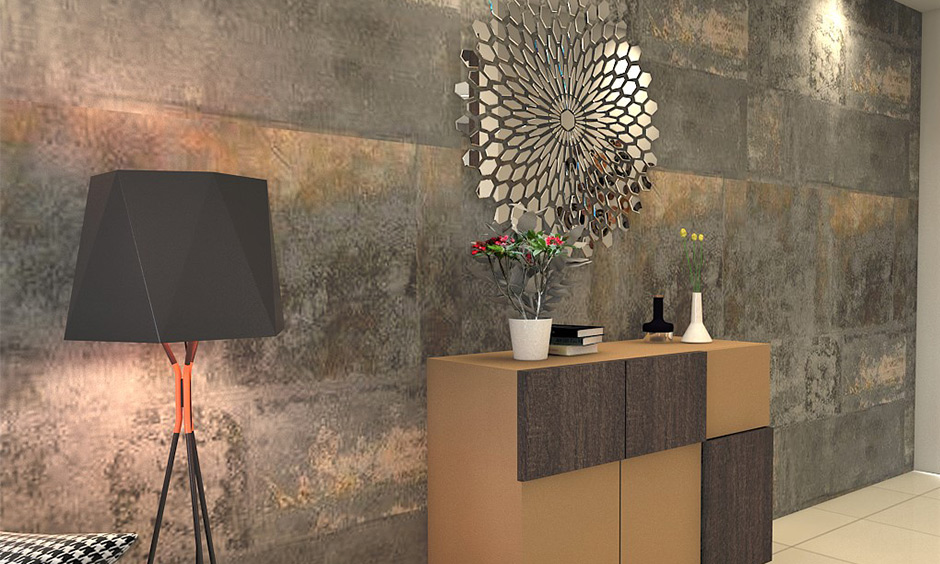 Mirror design in flower-shaped wall mirror design for the living room stands out against the industrial-style wall and the tripod floor lamp.