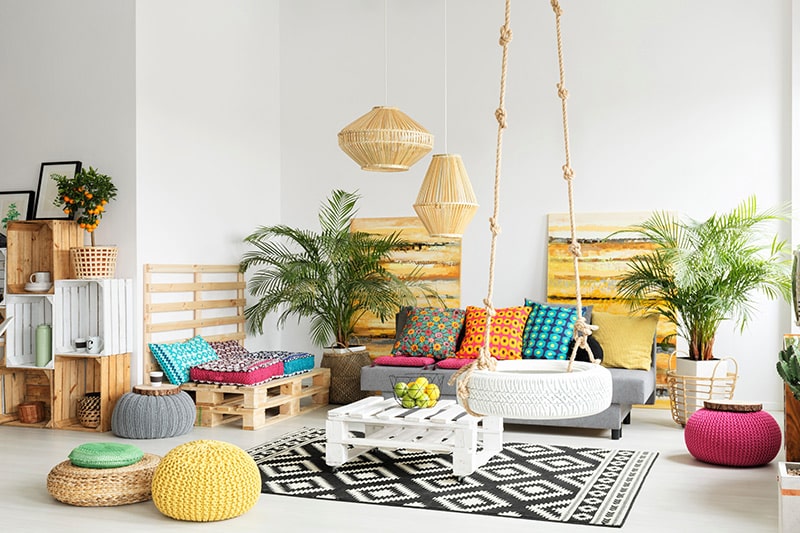 Creative home decor ideas by upcycling to make a hanging wheel swing, multi coloured poufs