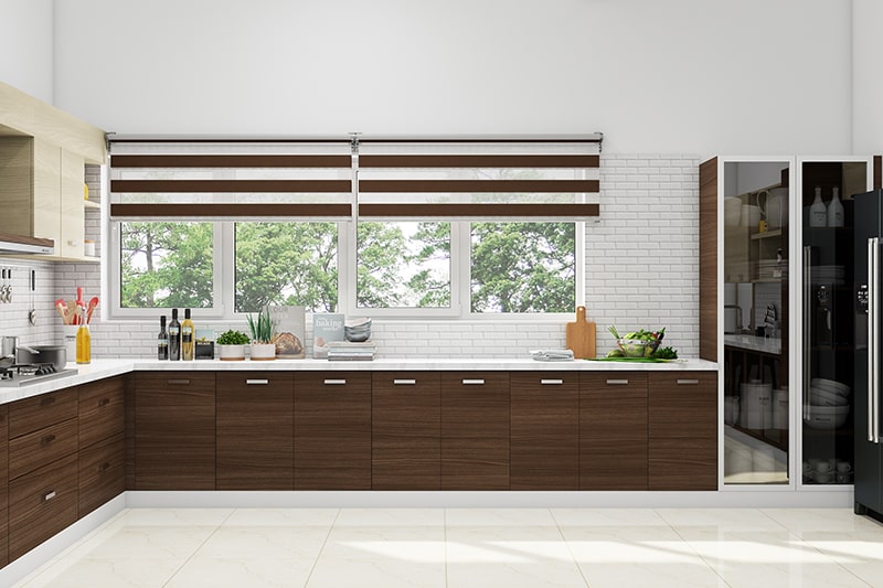 Kitchen window decoration with roller blinds bring in a creative mix of personality and pattern in kitchen