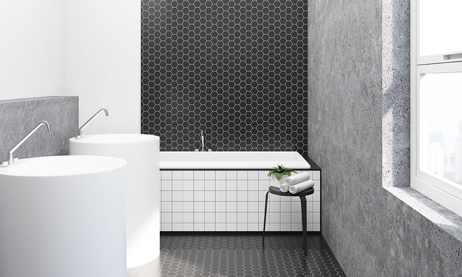 Latest trend in black and white bathroom design with small hexagon tiles