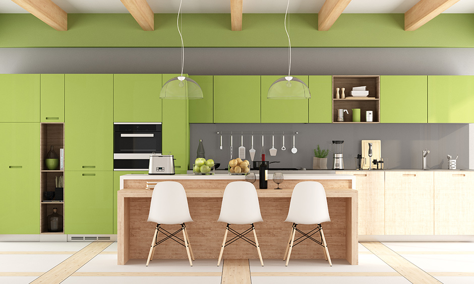 Pale green colour kitchen cabinets with light grey on the walls represent making a fresh start.