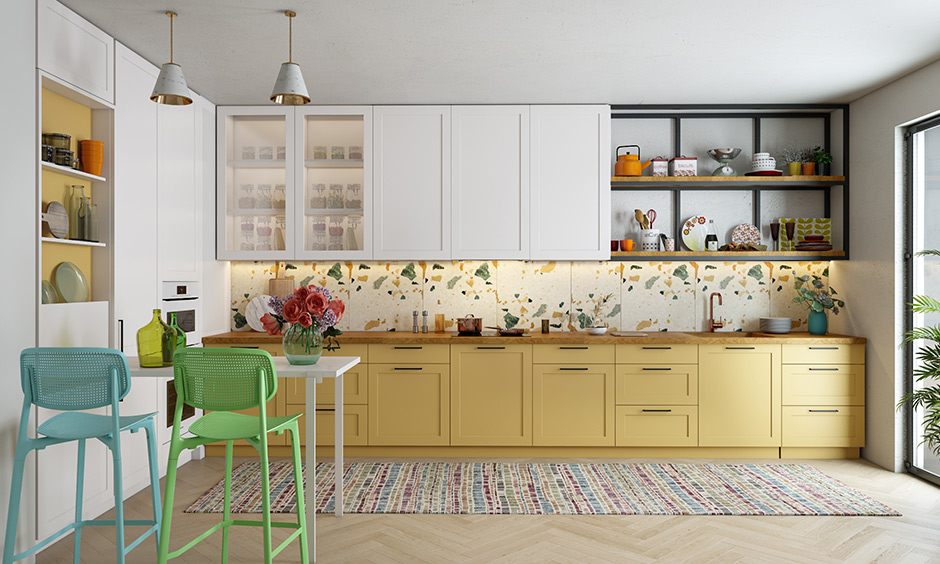 High end kitchen design trends with a colourful touch with cabinet , bright walls and vibrant pottery