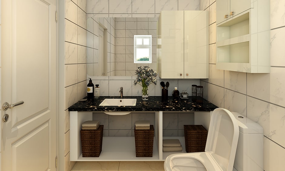 Black and white bathroom design ideas with a patterned black and white marble counter