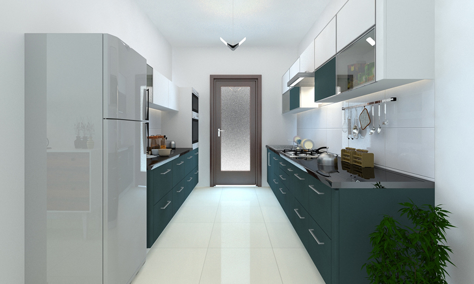 Darker shades of pine green kitchen cabinets with white walls reflect a sense of comfort.