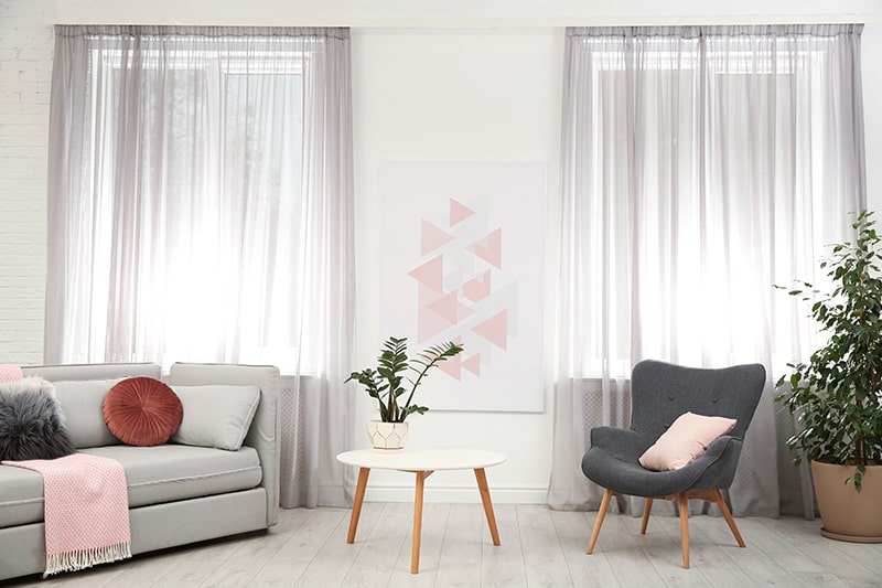 Simple curtain design for your home with silver-shaded sheer curtains