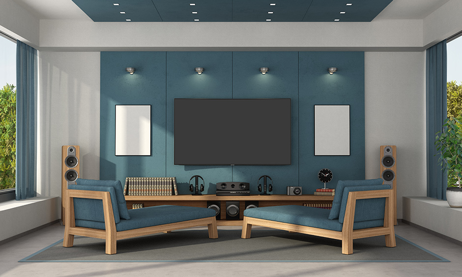 Blue home theatre room design looks elegant and straightforward.