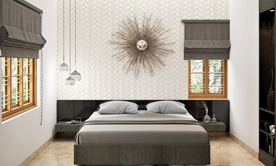 Small starburst wall mirror design looks charming and sophisticated in the white-walled and grey-themed bedroom.