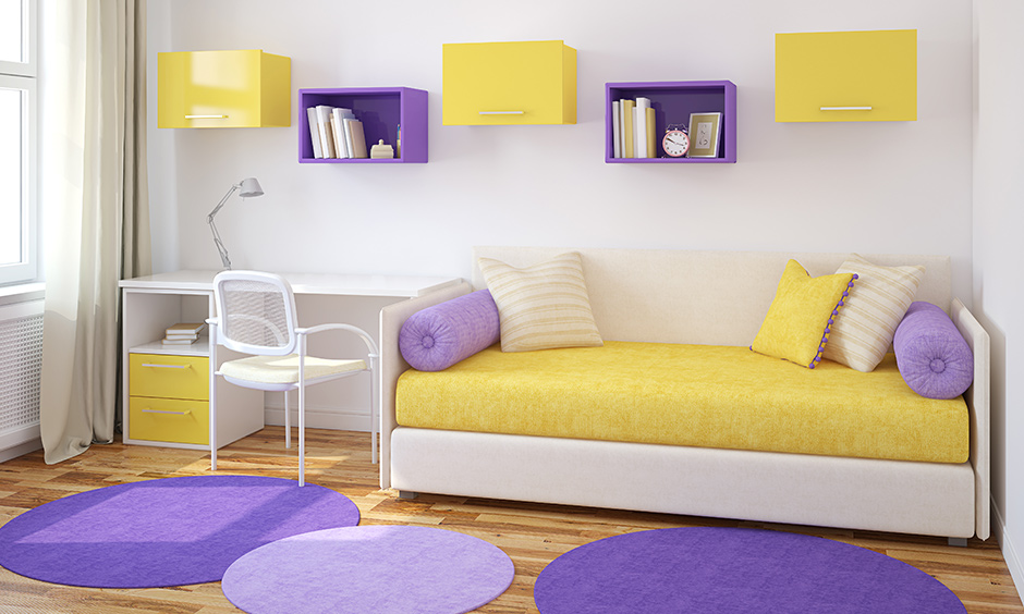 Yellow bedroom with a pinch of purple is an eye-catcher and adds to the aesthetics.