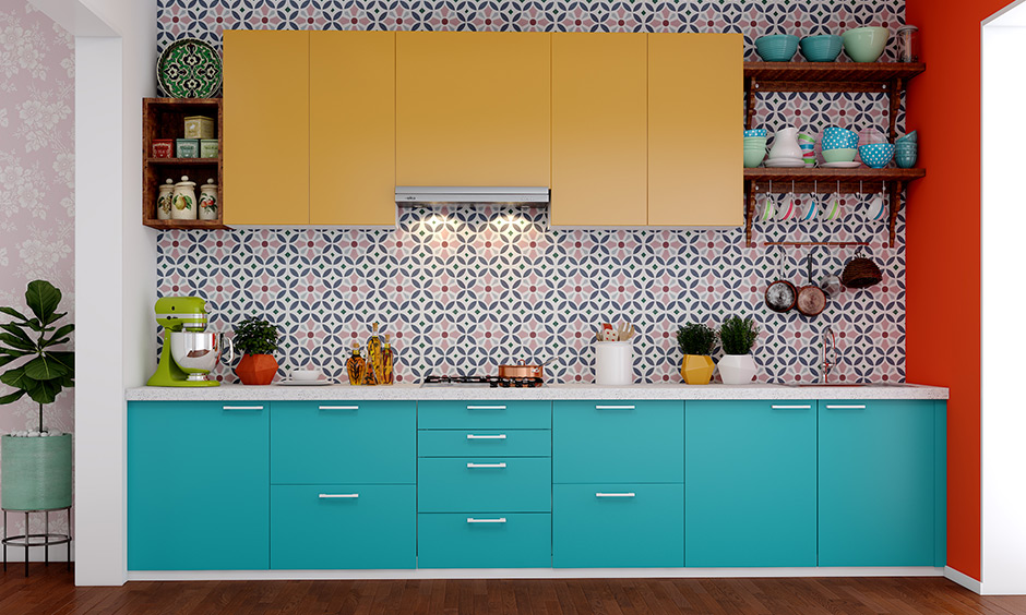 An eclectic low cost kitchen with basic cabinets on top and bottom along drawers  complement the base cabinets with under-sink 