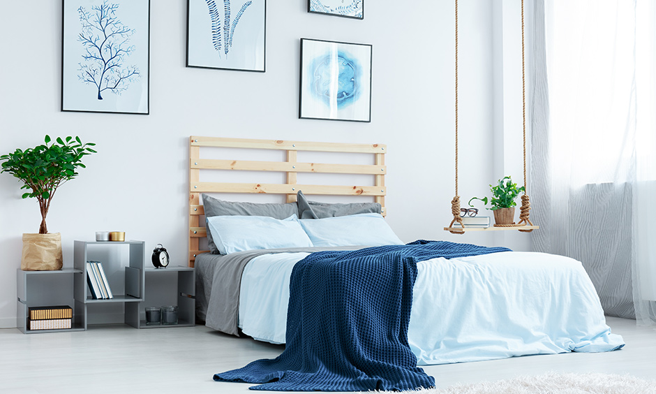 This bedside table design for bedroom built to resemble square boxes stacked up on top of each other