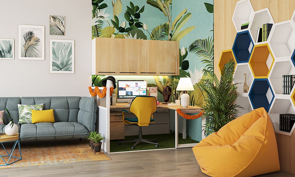 Tropical theme based cubicle decoration with a wallpaper and yellow chair