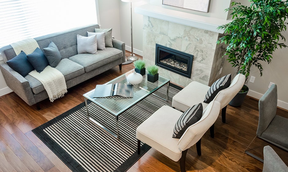 Beautiful glass coffee table design in black and white themed living room