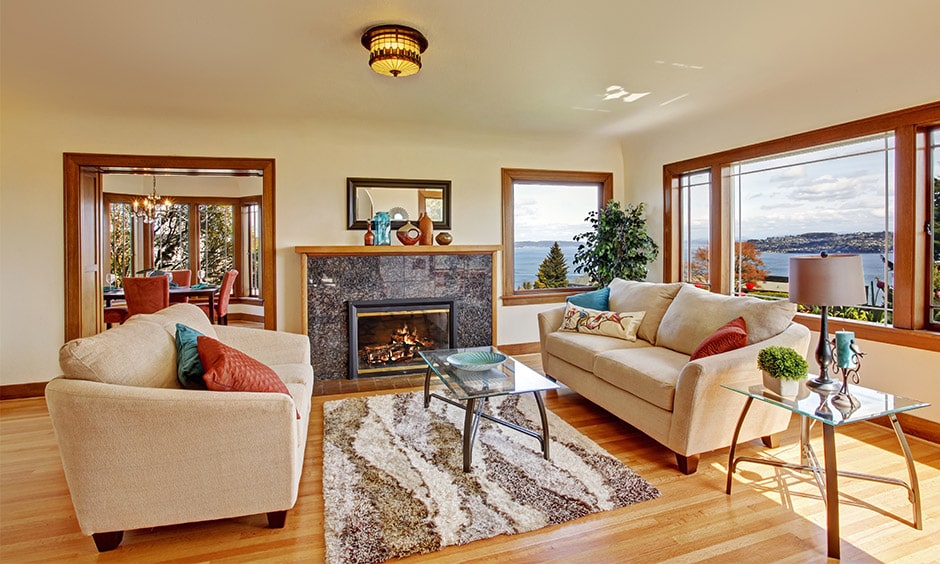 Glass coffee table with cream coloured sofa and a fireplace makes beautiful glass coffee table images